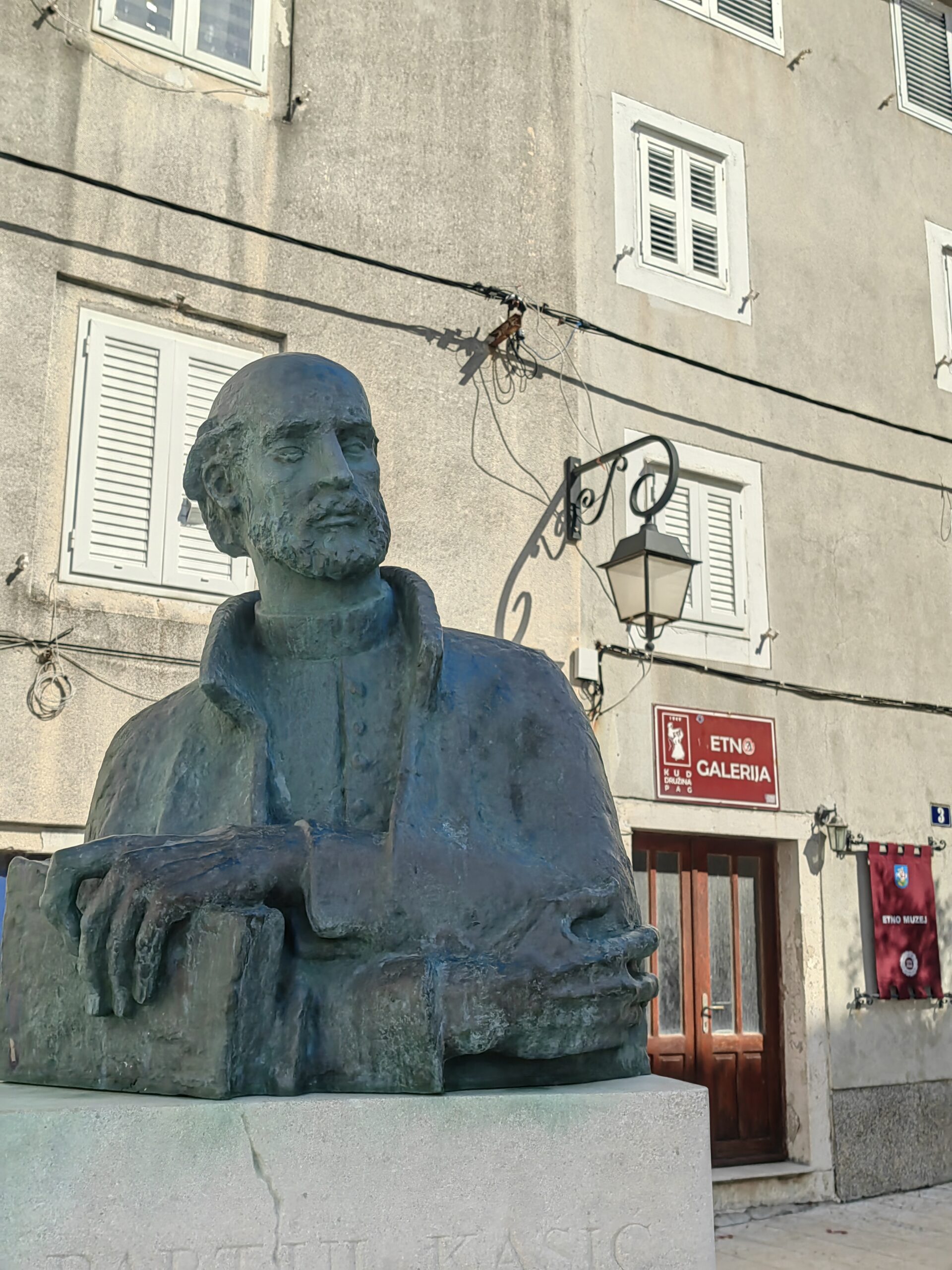 Statue of Bartul Kašić in the historic centre of Pag, Croatia