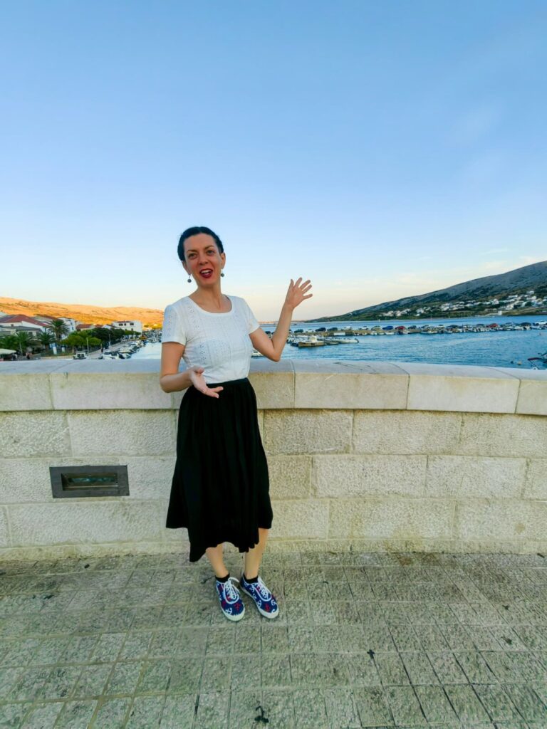 Tena, a licensed local tour guide, leading a walking tour in Pag, Croatia